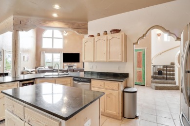 This custom Leo Husky home is a beautiful combination of nature on Paa-Ko Ridge Golf Club  in New Mexico - for sale on GolfHomes.com, golf home, golf lot