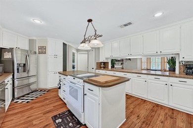 1246 Kiowa Drive West sits on a spacious double lot in the gated on Lake Kiowa Golf Course in Texas - for sale on GolfHomes.com, golf home, golf lot