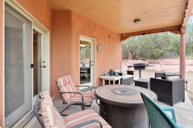 This custom Leo Husky home is a beautiful combination of nature on Paa-Ko Ridge Golf Club  in New Mexico - for sale on GolfHomes.com, golf home, golf lot