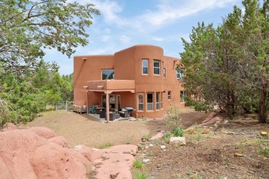 This custom Leo Husky home is a beautiful combination of nature on Paa-Ko Ridge Golf Club  in New Mexico - for sale on GolfHomes.com, golf home, golf lot