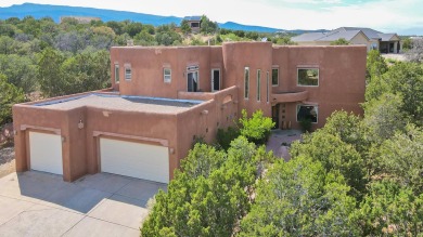 This custom Leo Husky home is a beautiful combination of nature on Paa-Ko Ridge Golf Club  in New Mexico - for sale on GolfHomes.com, golf home, golf lot