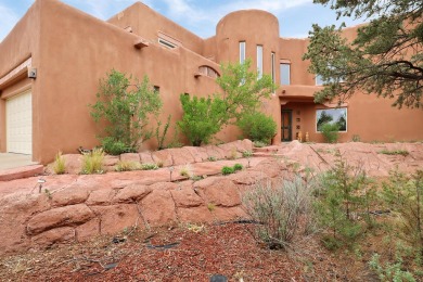 This custom Leo Husky home is a beautiful combination of nature on Paa-Ko Ridge Golf Club  in New Mexico - for sale on GolfHomes.com, golf home, golf lot