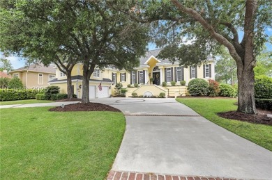 Enjoy tranquil lagoon views and a front-row seat to the 8th on Wexford Golf Club in South Carolina - for sale on GolfHomes.com, golf home, golf lot