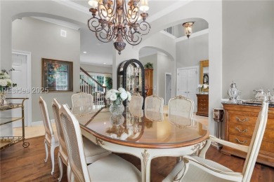 Enjoy tranquil lagoon views and a front-row seat to the 8th on Wexford Golf Club in South Carolina - for sale on GolfHomes.com, golf home, golf lot