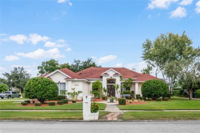 Welcome to this stunning custom built home in the heart of the on Rio Pinar Golf and Country Club in Florida - for sale on GolfHomes.com, golf home, golf lot