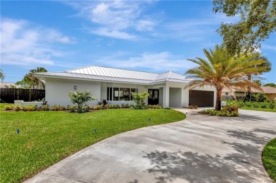 Welcome to this highly desirable home in the Village of Tequesta on Tequesta Country Club in Florida - for sale on GolfHomes.com, golf home, golf lot
