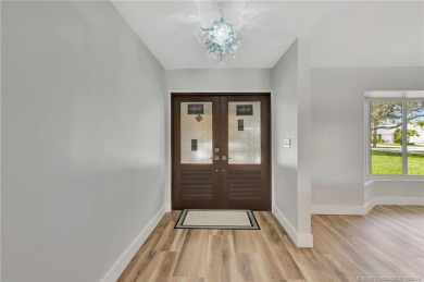 Welcome to this highly desirable home in the Village of Tequesta on Tequesta Country Club in Florida - for sale on GolfHomes.com, golf home, golf lot