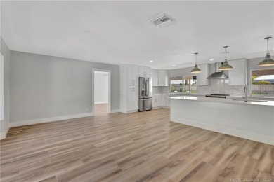 Welcome to this highly desirable home in the Village of Tequesta on Tequesta Country Club in Florida - for sale on GolfHomes.com, golf home, golf lot