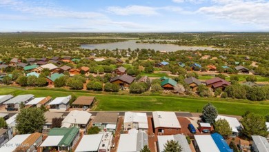 This PERFECTLY located 2 bed 2 bath home Across from the Fairway on Juniper Ridge R.V. Golf Resort in Arizona - for sale on GolfHomes.com, golf home, golf lot