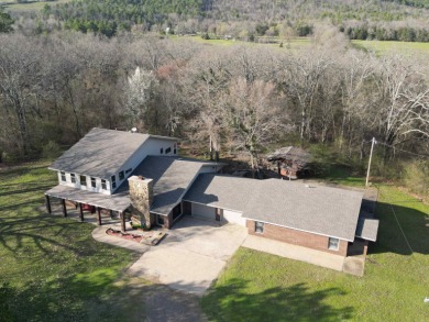 Enjoy hunting the Muddy Creek Wildlife Management Area, floating on Waldron Country Club in Arkansas - for sale on GolfHomes.com, golf home, golf lot