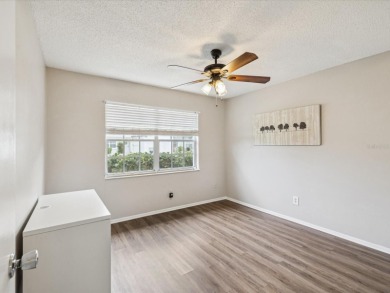 Nestled on the first hole of the Little Course golf course, this on Seven Springs Golf and Country Club in Florida - for sale on GolfHomes.com, golf home, golf lot
