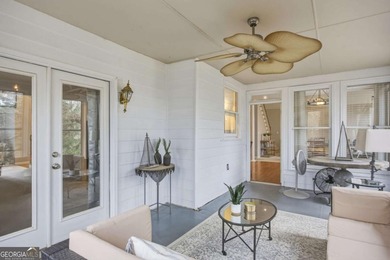 Welcome to this 5-bedroom home that sits on a corner lot and on Towne Lake Hills Golf Club in Georgia - for sale on GolfHomes.com, golf home, golf lot