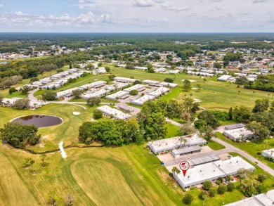 Nestled on the first hole of the Little Course golf course, this on Seven Springs Golf and Country Club in Florida - for sale on GolfHomes.com, golf home, golf lot