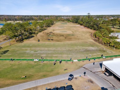 Nestled on the first hole of the Little Course golf course, this on Seven Springs Golf and Country Club in Florida - for sale on GolfHomes.com, golf home, golf lot