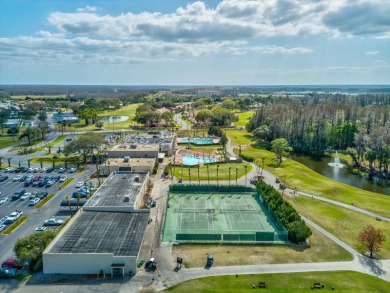 Nestled on the first hole of the Little Course golf course, this on Seven Springs Golf and Country Club in Florida - for sale on GolfHomes.com, golf home, golf lot