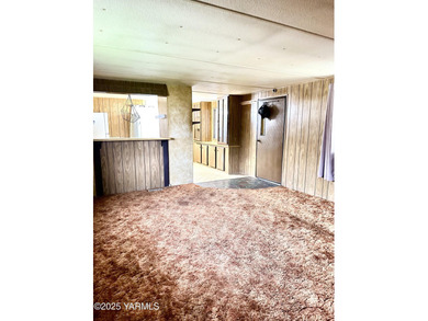 Located on parcel 181309-21003, this manufactured home is just on Suntides Golf Course in Washington - for sale on GolfHomes.com, golf home, golf lot