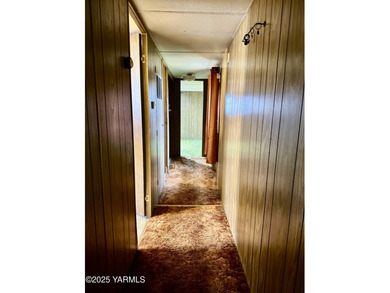 Located on parcel 181309-21003, this manufactured home is just on Suntides Golf Course in Washington - for sale on GolfHomes.com, golf home, golf lot