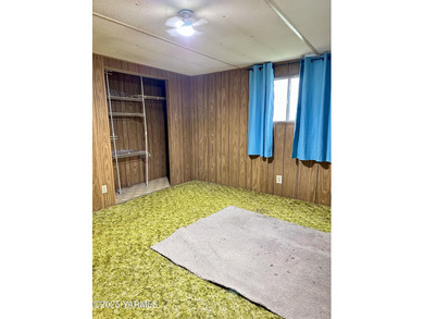 Located on parcel 181309-21003, this manufactured home is just on Suntides Golf Course in Washington - for sale on GolfHomes.com, golf home, golf lot