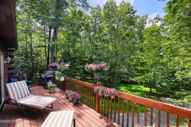 Meticulously maintained log-sided lakefront on TinkWig Lake with on Woodloch Springs Country Club in Pennsylvania - for sale on GolfHomes.com, golf home, golf lot