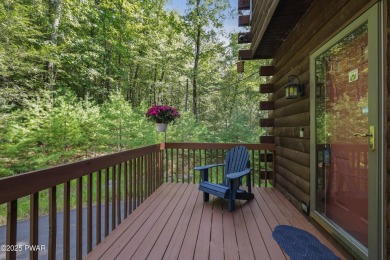 Meticulously maintained log-sided lakefront on TinkWig Lake with on Woodloch Springs Country Club in Pennsylvania - for sale on GolfHomes.com, golf home, golf lot