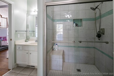 This beautiful home is located in the gated Gates Four community on Gates Four Golf and Country Club in North Carolina - for sale on GolfHomes.com, golf home, golf lot