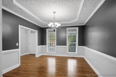 This beautiful home is located in the gated Gates Four community on Gates Four Golf and Country Club in North Carolina - for sale on GolfHomes.com, golf home, golf lot