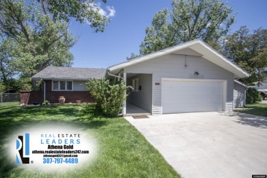 Welcome to this beautifully maintained Single-level home nestled on Paradise Valley Country Club in Wyoming - for sale on GolfHomes.com, golf home, golf lot