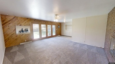 Welcome to this beautifully maintained Single-level home nestled on Paradise Valley Country Club in Wyoming - for sale on GolfHomes.com, golf home, golf lot