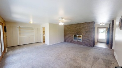 Welcome to this beautifully maintained Single-level home nestled on Paradise Valley Country Club in Wyoming - for sale on GolfHomes.com, golf home, golf lot