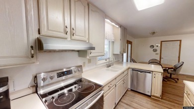 Welcome to this beautifully maintained Single-level home nestled on Paradise Valley Country Club in Wyoming - for sale on GolfHomes.com, golf home, golf lot