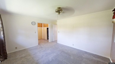 Welcome to this beautifully maintained Single-level home nestled on Paradise Valley Country Club in Wyoming - for sale on GolfHomes.com, golf home, golf lot