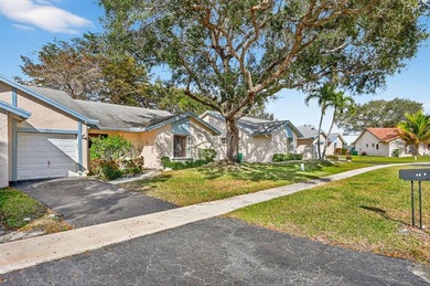 Stunning waterfront beauty on a quiet cul-de-sac street is on Colony West Country Club in Florida - for sale on GolfHomes.com, golf home, golf lot