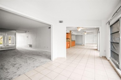 Beautifully updated condo offering modern comfort, effortless on East Bay Golf Club in Florida - for sale on GolfHomes.com, golf home, golf lot