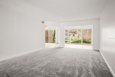 Beautifully updated condo offering modern comfort, effortless on East Bay Golf Club in Florida - for sale on GolfHomes.com, golf home, golf lot