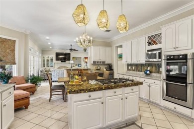 Exquisitely positioned on a desirable corner lot, this elegant on English Turn Golf and Country Club in Louisiana - for sale on GolfHomes.com, golf home, golf lot