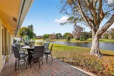 Stunning waterfront beauty on a quiet cul-de-sac street is on Colony West Country Club in Florida - for sale on GolfHomes.com, golf home, golf lot