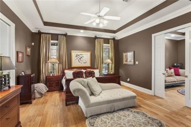 Exquisitely positioned on a desirable corner lot, this elegant on English Turn Golf and Country Club in Louisiana - for sale on GolfHomes.com, golf home, golf lot