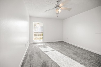 Beautifully updated condo offering modern comfort, effortless on East Bay Golf Club in Florida - for sale on GolfHomes.com, golf home, golf lot