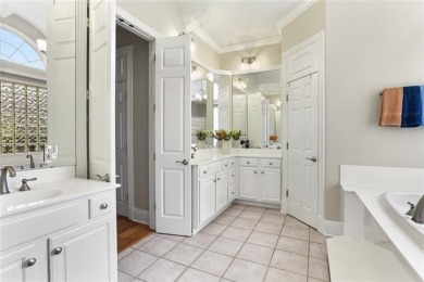 Exquisitely positioned on a desirable corner lot, this elegant on English Turn Golf and Country Club in Louisiana - for sale on GolfHomes.com, golf home, golf lot