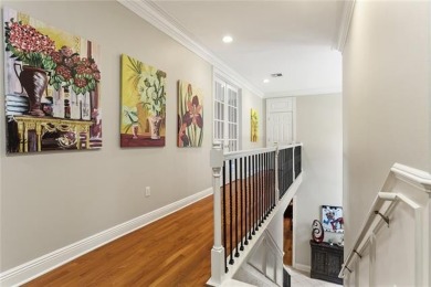Exquisitely positioned on a desirable corner lot, this elegant on English Turn Golf and Country Club in Louisiana - for sale on GolfHomes.com, golf home, golf lot