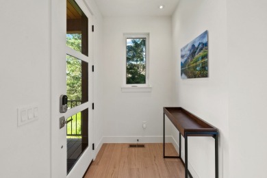 Modern design and Montana living come together in this 4-bedroom on Meadow Lake Golf Resort in Montana - for sale on GolfHomes.com, golf home, golf lot