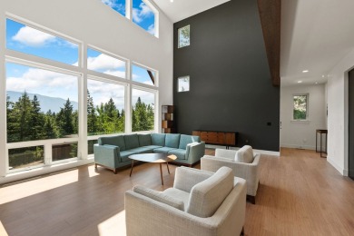 Modern design and Montana living come together in this 4-bedroom on Meadow Lake Golf Resort in Montana - for sale on GolfHomes.com, golf home, golf lot