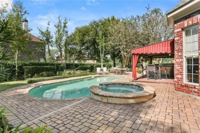 Exquisitely positioned on a desirable corner lot, this elegant on English Turn Golf and Country Club in Louisiana - for sale on GolfHomes.com, golf home, golf lot