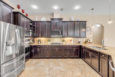 Stunning 4BR/3BA Home with Office  Whole-House Generator in on Sugar Mill Country Club in Florida - for sale on GolfHomes.com, golf home, golf lot
