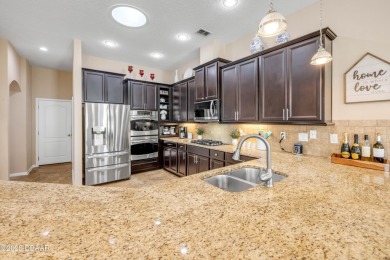 Stunning 4BR/3BA Home with Office  Whole-House Generator in on Sugar Mill Country Club in Florida - for sale on GolfHomes.com, golf home, golf lot