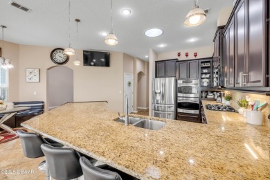 Stunning 4BR/3BA Home with Office  Whole-House Generator in on Sugar Mill Country Club in Florida - for sale on GolfHomes.com, golf home, golf lot