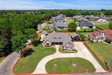 Golf Course View & City Lake View on Mount Pleasant Country Club in Texas - for sale on GolfHomes.com, golf home, golf lot