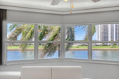Enjoy waterfront living with wide water views from this freshly on North Palm Beach Country Club in Florida - for sale on GolfHomes.com, golf home, golf lot