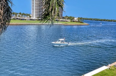 Enjoy waterfront living with wide water views from this freshly on North Palm Beach Country Club in Florida - for sale on GolfHomes.com, golf home, golf lot