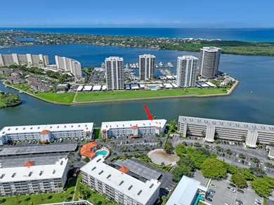 Enjoy waterfront living with wide water views from this freshly on North Palm Beach Country Club in Florida - for sale on GolfHomes.com, golf home, golf lot